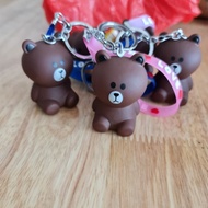 Beeping brown bear keychain, multicolored love string