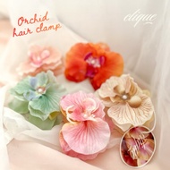 Clique Orchid flower hair clamp
