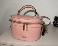 Coach 粉色化妝包