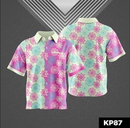 KP87 short-sleeved shirt featuring a pink and blue floral batik print.