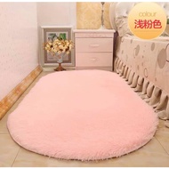 Decorative elliptical fur rug