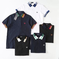 เสื้อยืดแขนสั้นคอปกแฟชั่นเสื้อโปโลของผู้ชายผ้าคอตตอนมีหู Fred Perry เสื้อโปโลข้าวสาลีมีหูเสื้อโปโล