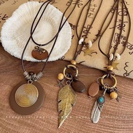 < > New Chinese Retro Long Sweater Chain Zen Feather Necklace Women's 2024 Ethnic Style Stacking Acc