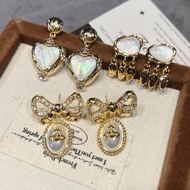 Empress Dowager Cixi French white shell earrings with heart-shaped geometric design, niche, light lu