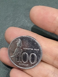 Uang koin 100 kakatua raja asli