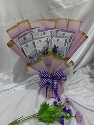 Buket uang kosongan 10 slot dengan desain elegan terdiri dari uang kertas 10000 rupiah dibungkus ker
