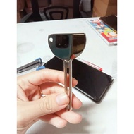 Tube squeezer key (also known as toothpaste squeezer or dye tube squeezer)