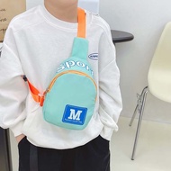 TMMD ไนลอนทำจากไนลอน กระเป๋าคาดอกเด็ก สไตล์เกาหลีแบบ ตัวอักษร M กระเป๋า Crossbody สำหรับเด็ก แฟชั่นสำหรับผู้หญิง ซิปมีซิป กระเป๋าสะพายเดินทางกลางแจ้ง เด็กชาย/เด็กหญิง