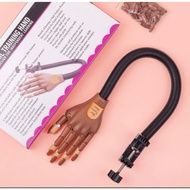 Articulated prosthetic hand for nail practice