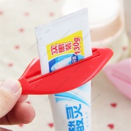 Household Products Roll Squeeze Dispenser Household Red Presser Household Daily Necessities Bulk Extruder Bathroom Accesories Pink Toothpaste Holder 5.2g livehouse_sg