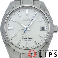二手精工（Seiko）Grand Grand Seiko Spring Drive 男士腕錶，型號 SBGA011/9R65-0AE0，由原廠進行全面保養（仍在保固期內）。包含原廠錶盒和維修手冊。鈦金