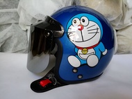 HELM BOGO DORAEMON DEWASA BIRU TUA KACA DATAR SILVER