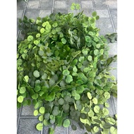 Vine of apple leaves with elephant ears, fake branches and leaves for decoration