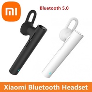 Original Xiaomi Bluetooth รุ่นเยาวชนหูฟัง Mi การควบคุมระดับเสียงบลูทูธหูฟังแบบแฮนด์ฟรีพร้อมไมโครโฟนในตัวสำหรับ Xiaomi Series โทรศัพท์มือถือ