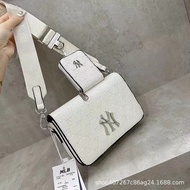 《323》ประเทศเกาหลีใต้ mlb ลายนูน PU กระเป๋ากล้องสายตายาว CNK กระเป๋าสะพายหนังผู้ชายและผู้หญิงกระเป๋าส