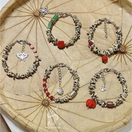 Handmade Dalmatian Jasper bracelet with unique spotted pattern mixed with Vingtage charm