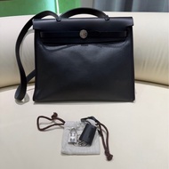 Hermes愛馬仕herbag31黑銀防水布拼皮斜挎包 鎖鑰匙  子袋。