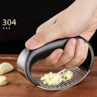 Multi-purpose garlic crusher, garlic press, garlic press