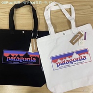 นาฬิกาสุภาพบุรุษและสุภาพสตรี Patagonia Patagonia Patagonia แนวย้อนยุคกระเป๋าผ้าใบขนาดใหญ่ความจุสำหรับผู้ชายและผู้หญิง