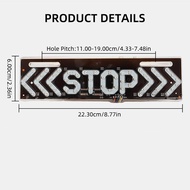 Motorcycle LED tail lights display the word STOP and mounted on license plate