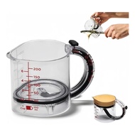 Cf Adjustable 4-in-1 Measuring Cup with Scraper Base.
