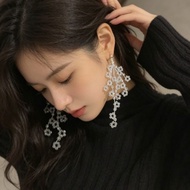 1pair Tassel earrings exude a luxurious and elegant vacation style