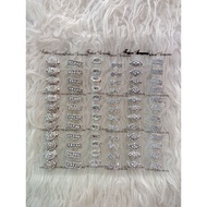 Dozens of chin brooches, chin brooches, dozens of brooches