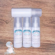 Pink bottle wig spray