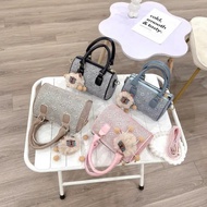 Fashionable women's crossbody bag in Clear shape, size 19cm with cute teddy bear charm, suitable for