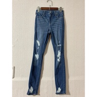 ⁠ [Used Hollister] Women's jeans, blue ripped at the knees, high waisted, slim fit, size 27, code 17