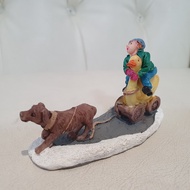 Christmas Village Kid riding duck sleigh with dog (playing on Snowy Street )  9 x 3.5 x 5 cm Display