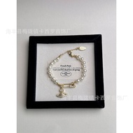2026 New Style Empress Dowager West Saturn Paper Clip Empress Dowager West High Version Pearl Bracel