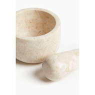 Minimalist beige marble mortar and pestle