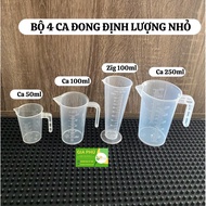 Set of 4 small measuring cups