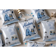 packed goodies bag with insert, chip bag, party favour
