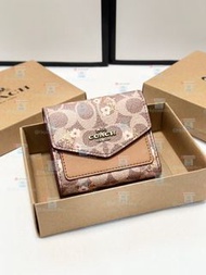 蔻馳女包短款女士手拿包 錢包 卡包5