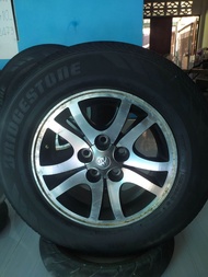 ล้อแม็กเดิมพร้อมยาง ล้อไทเกอร์ ไมตี้เอ็ก ขอบ15 กว้าง6นิ้ว 5รู แม็กมือสอง ไม่ดุ้ง ไม่ร้าว ใช้งานได้ปก