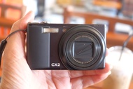 มือสอง ) กล้อง ricoh cx2 สีดำเต็มระบบ เมนูไทย ( ภาพฟุ้งเล็กน้อย)