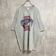 เสื้อยืดคอกลมแขนสั้นพิมพ์ลาย GILDAN NCAA American Football สีเทา ไซส์ XL