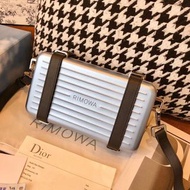 Rimowa and Dior Personal Clutch