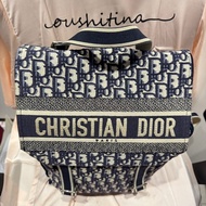 （最後特價優惠、錯過就下架囉）DIOR M1293VRW_M928 藍色緹花布帆布雙扣後背包