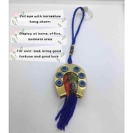 Evil eye with horseshoe hanging charm