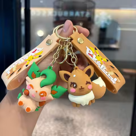 Pokémon Eevee Family Keychain Gift Set, Complete Evolution PVC Keychain with Official Pokéball Clip,