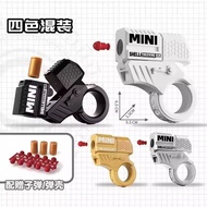 Mini finger decompression ring rotating gun cool and capable of firing shell throwing toy