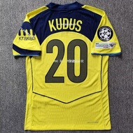 เสื้อฟุตบอลทอตแนมฮอตสเปอร์ส ฤดูกาล 2025 แขนสั้น ทรงสลิมฟิต วัสดุโพลีเอสเตอร์ ระบายความชื้นได้ดี เสื้