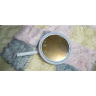 Circle mirror with hard plastic cover sided