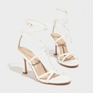 รองเท้าส้นสูงแบบสแตรป ผู้หญิง ปลายแหลม เซ็กซี่ หนังเงา PU ติดกาวไขว้ หรูหรา สไตล์รอมัน ส้นเข็ม สำหรั