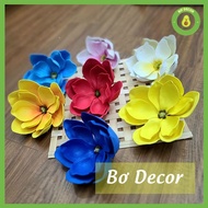 Beautiful multicolored magnolia flowers decorate CNY, decorate cake towers, water towers and fortune