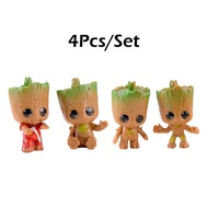 จัดส่งรวดเร็ว ชุด4ชิ้น Baby Groot โมเดลตุ๊กตาจิ๋ว figure แต่งสวน บ้าน โต๊ะทำงาน แบบPVC