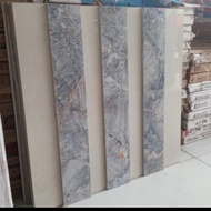 list plant granit 10x60 motif marmer grey glossy